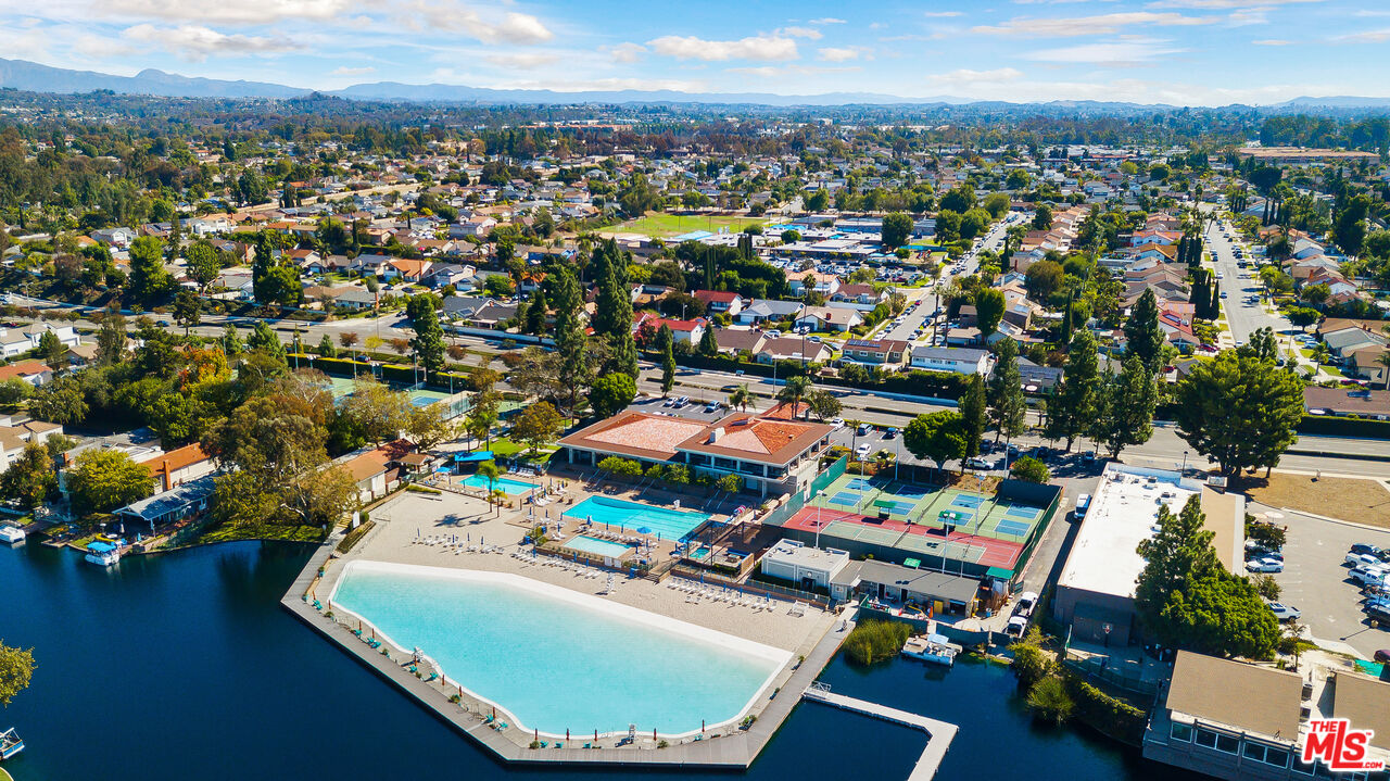 24193 Harbor Ridge Lane, Unit 81 Lake Forest, CA 92630 - Photo 38 of 43 an aerial view of a houses with a swimming pool