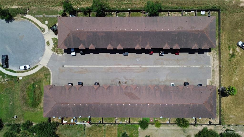 1500 Humming Bird Court, Unit 14 Pharr, TX 78577 - Photo 24 of 26 an aerial view of a house with a yard