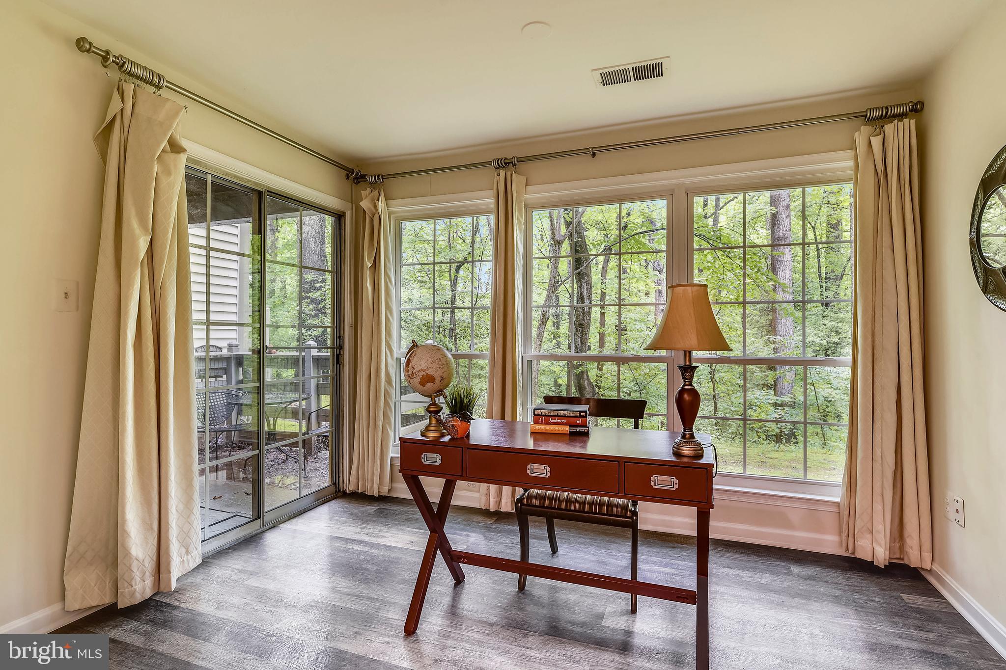 2241 Lovedale Lane, Unit B Reston, VA 20191 - Photo 23 of 27 a living room with furniture and a window