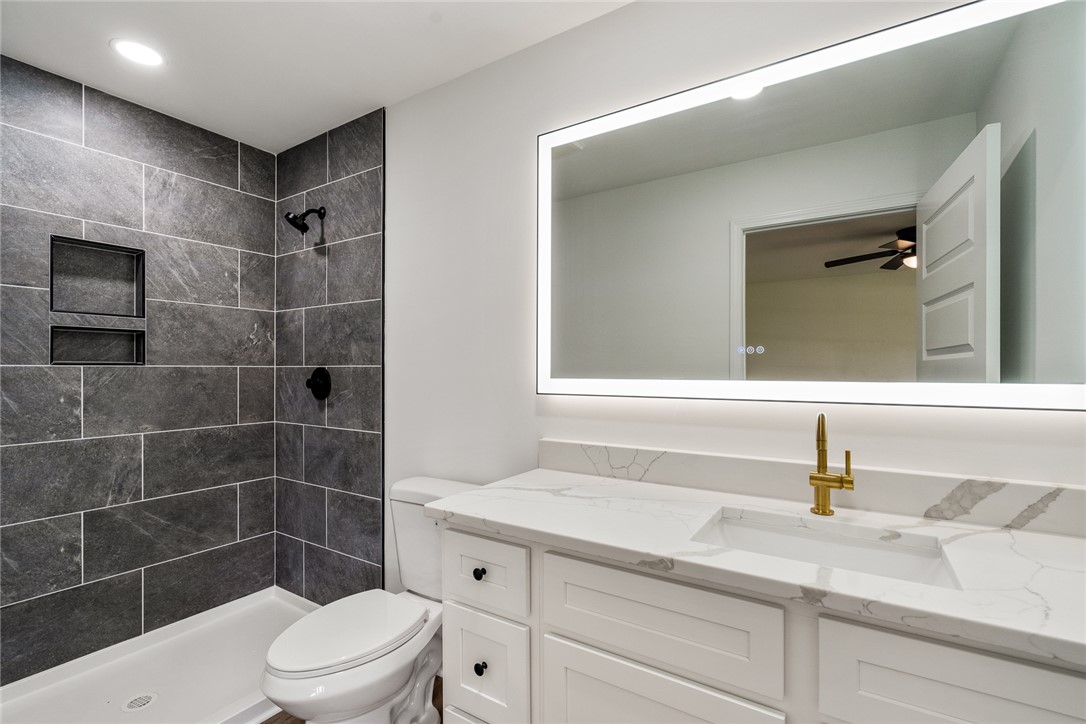 300 Vandiver Road Anderson, SC 29621 - Photo 16 of 30 Refined primary bath features a spacious shower with sleek tile and a double vanity.