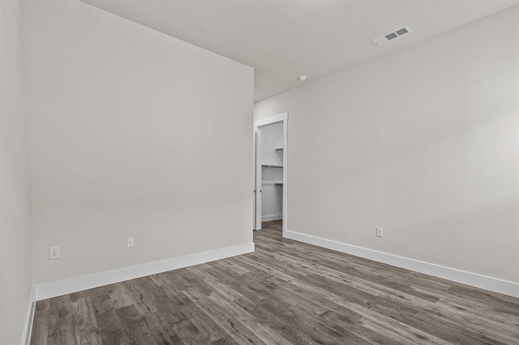 3284 Ganzer Road West, Unit 1107A Denton, TX 76207 - Photo 14 of 37 a view of an empty room