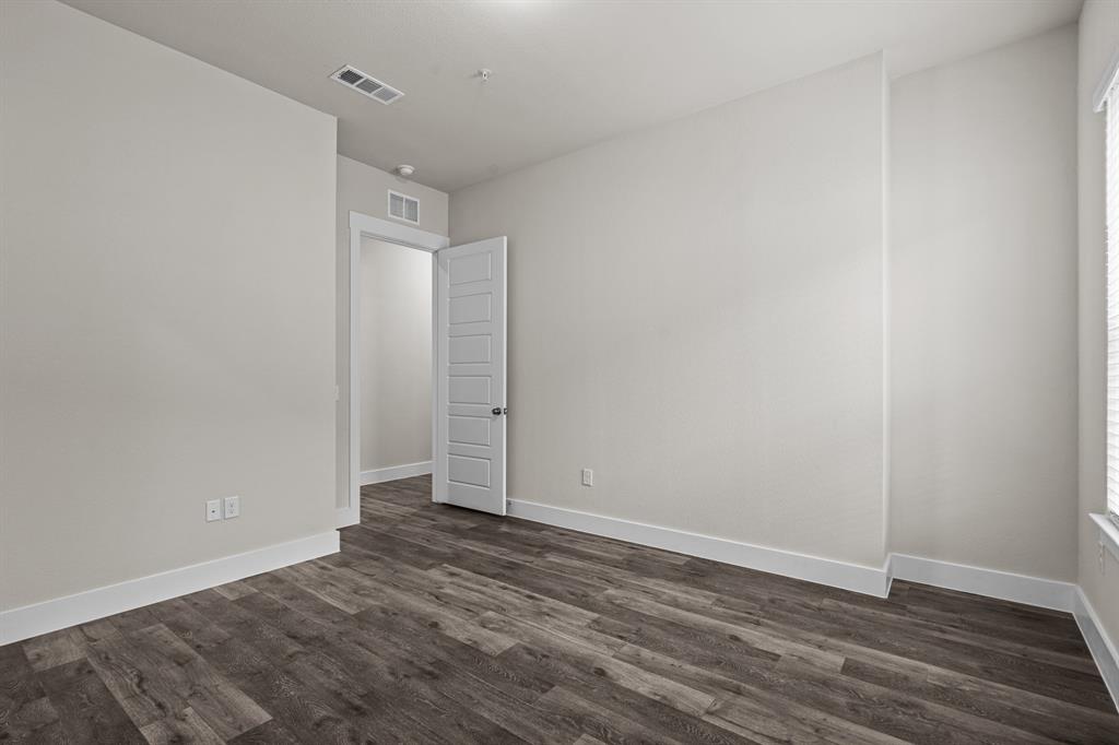 3284 Ganzer Road West, Unit 1107A Denton, TX 76207 - Photo 20 of 37 a view of an empty room