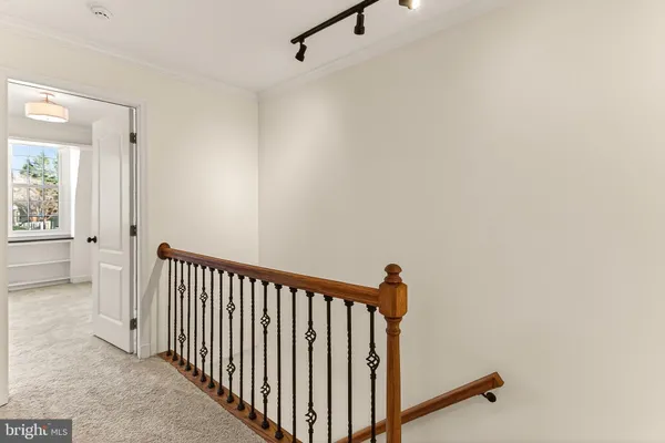 a bedroom with a bed and a table