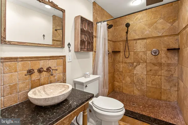 a bathroom with a bathtub
