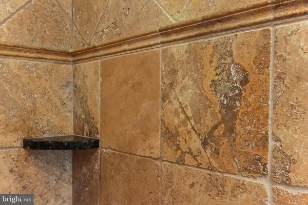 a kitchen with a refrigerator and a sink