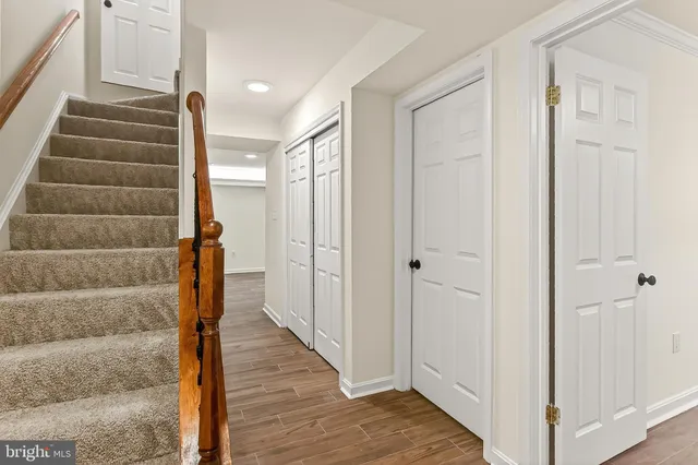 a living room with furniture fireplace and flat screen tv
