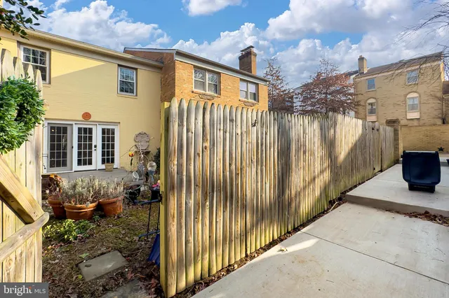 a sign board with parking space