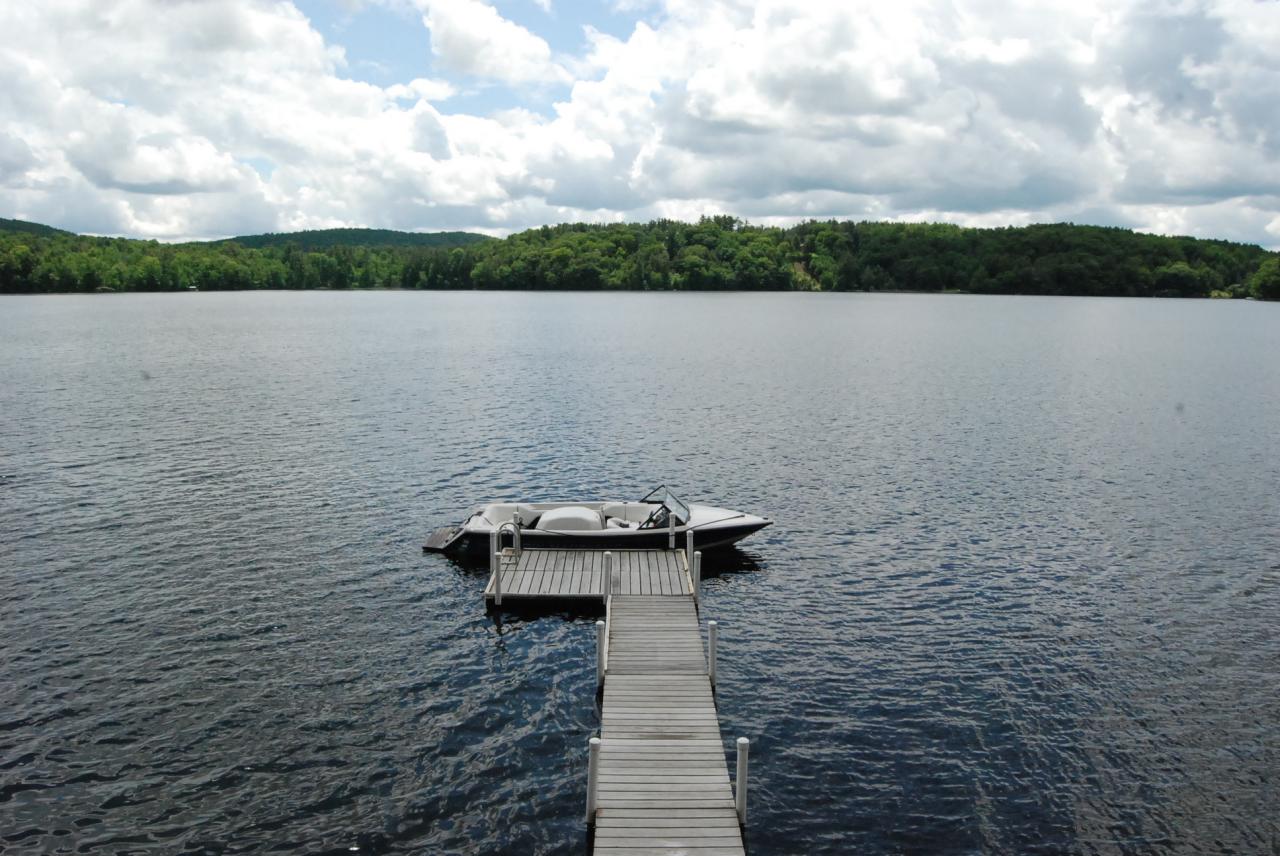 151 Hupi Road Monterey, MA 01245 - Photo 11 of 31 a view of a lake with mountain in the background