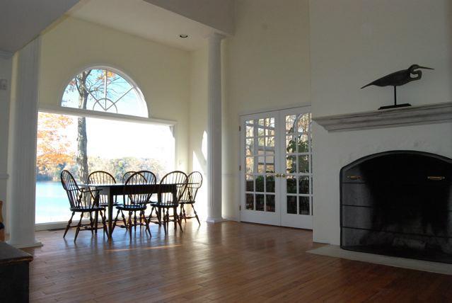 151 Hupi Road Monterey, MA 01245 - Photo 13 of 31 a view of a dining room with furniture window and wooden floor