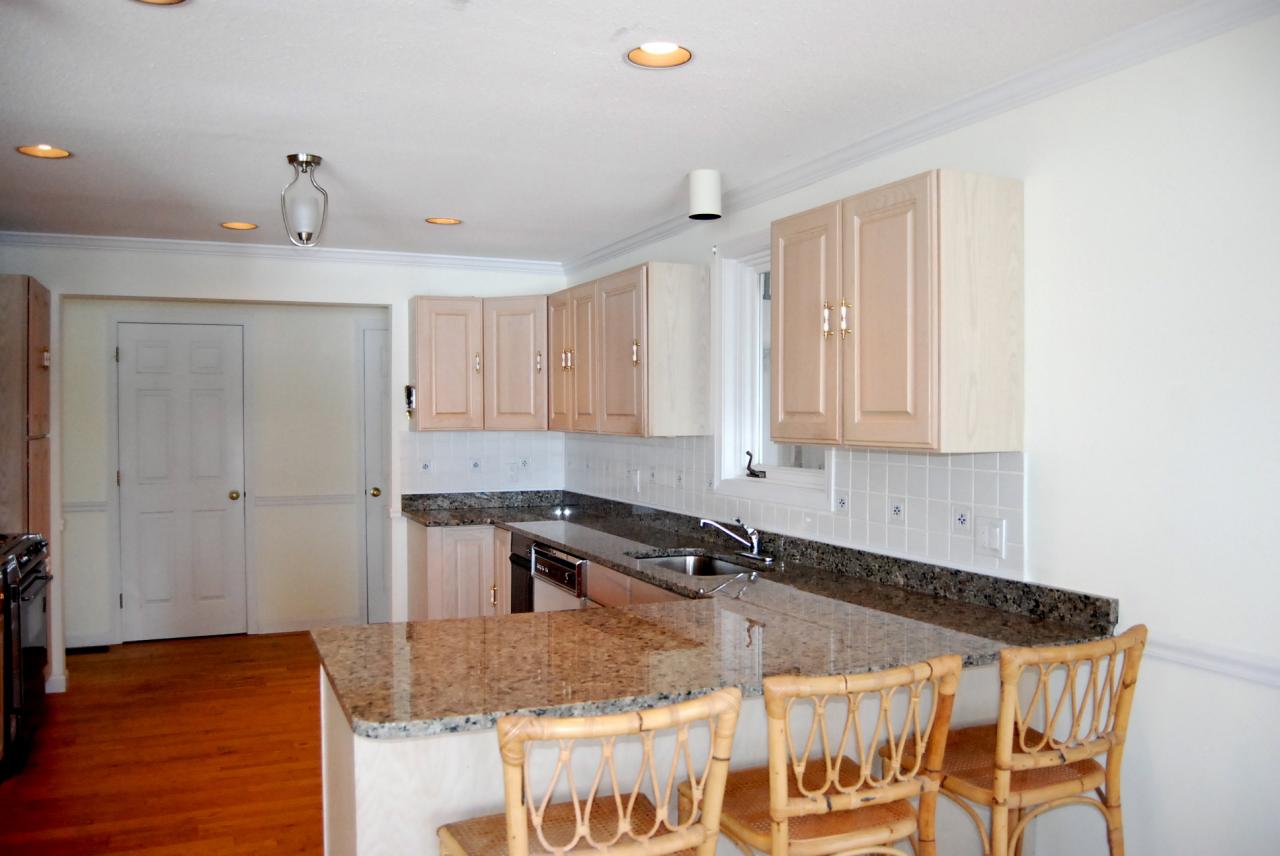 151 Hupi Road Monterey, MA 01245 - Photo 18 of 31 a kitchen with a sink and cabinets