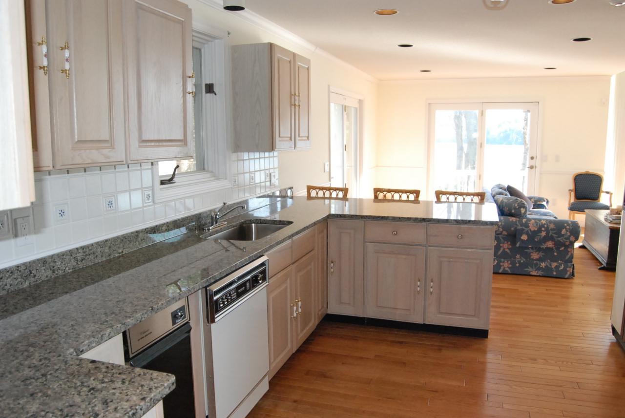 151 Hupi Road Monterey, MA 01245 - Photo 19 of 31 a large kitchen with stainless steel appliances granite countertop a sink and a stove
