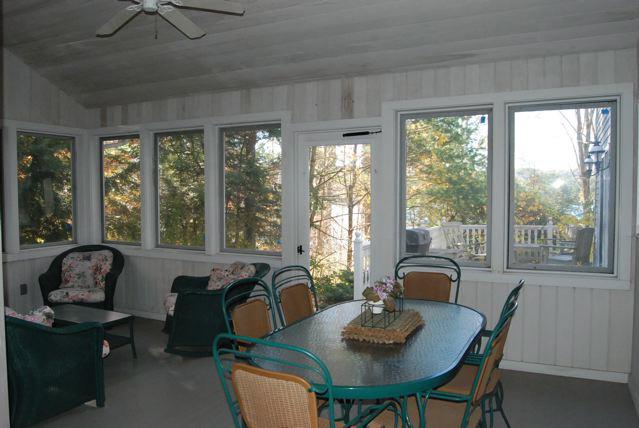 151 Hupi Road Monterey, MA 01245 - Photo 26 of 31 a view of a dining room with furniture window and outside view