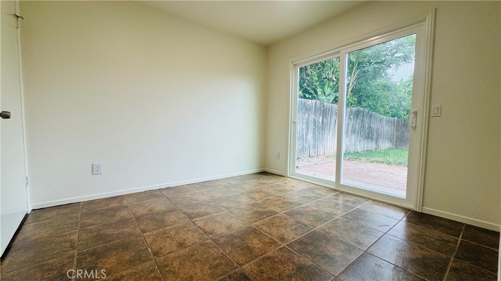 4628 Bird Farm Road Chino Hills, CA 91709 - Photo 9 of 16 a view of an empty room with glass door