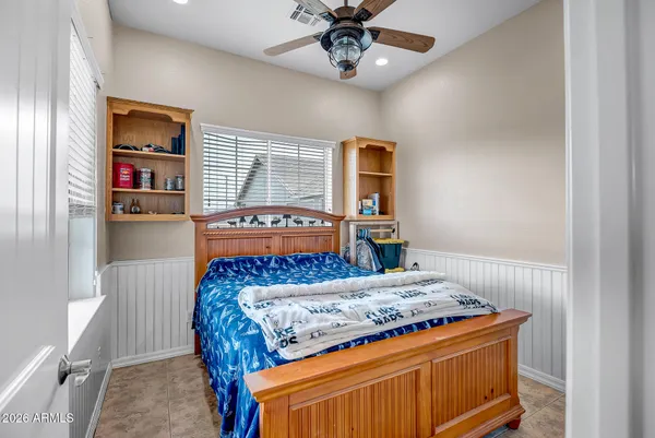 a view of a patio with table and chairs a barbeque with wooden fence
