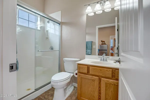 a view of a swimming pool with a lounge chair