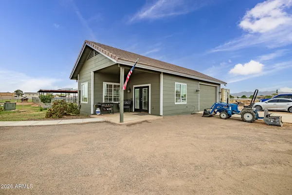 a view of a backyard with stairs