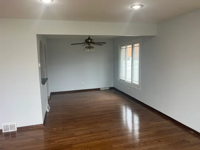 a view of an empty room and window