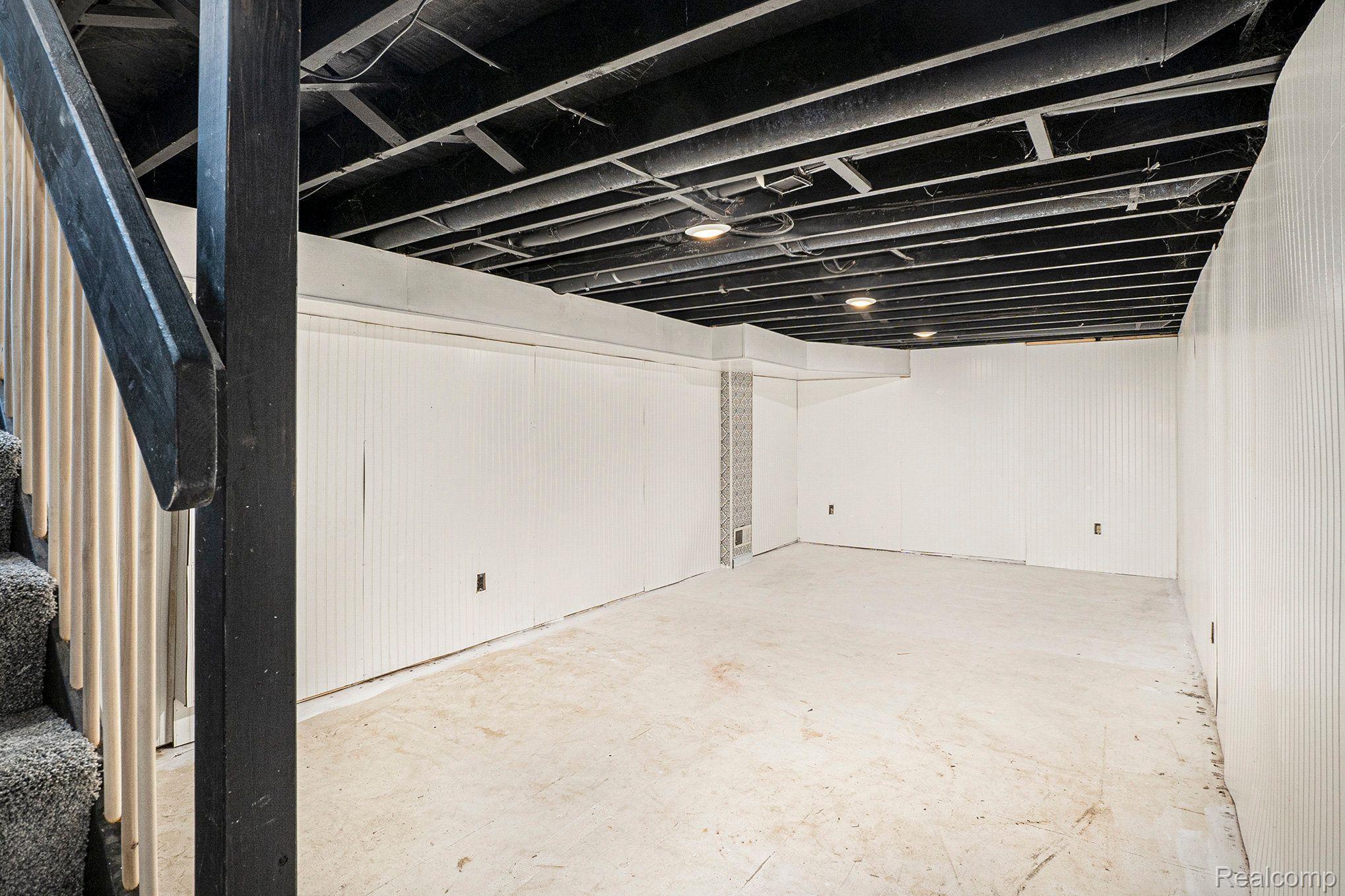 14498 Eddy Lake Road Fenton, MI 48430 - Photo 12 of 18 Partially finished basement