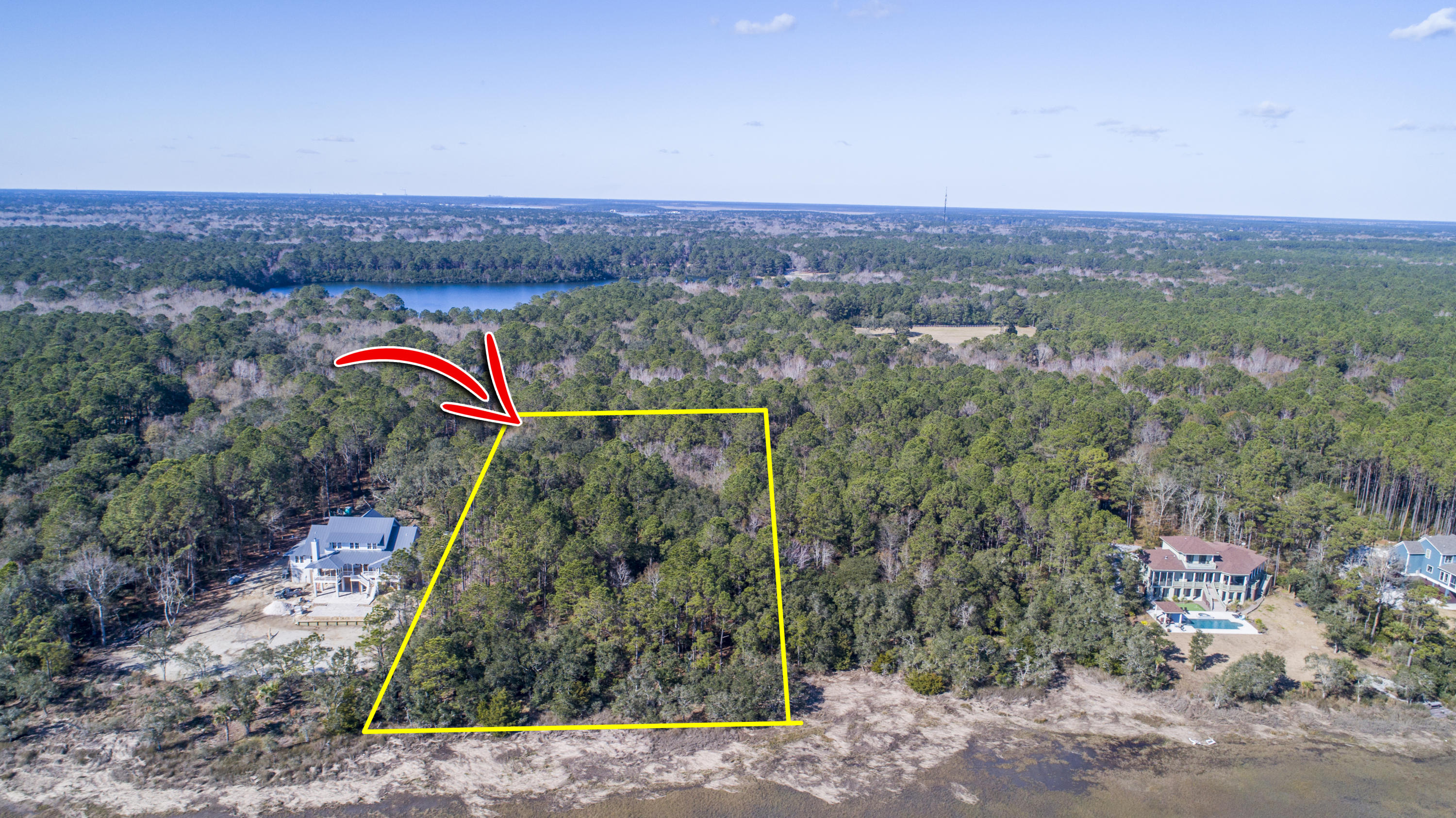 19 Longmarsh Road Awendaw, SC 29429 - Photo 16 of 46 Aerial towards development with lot line