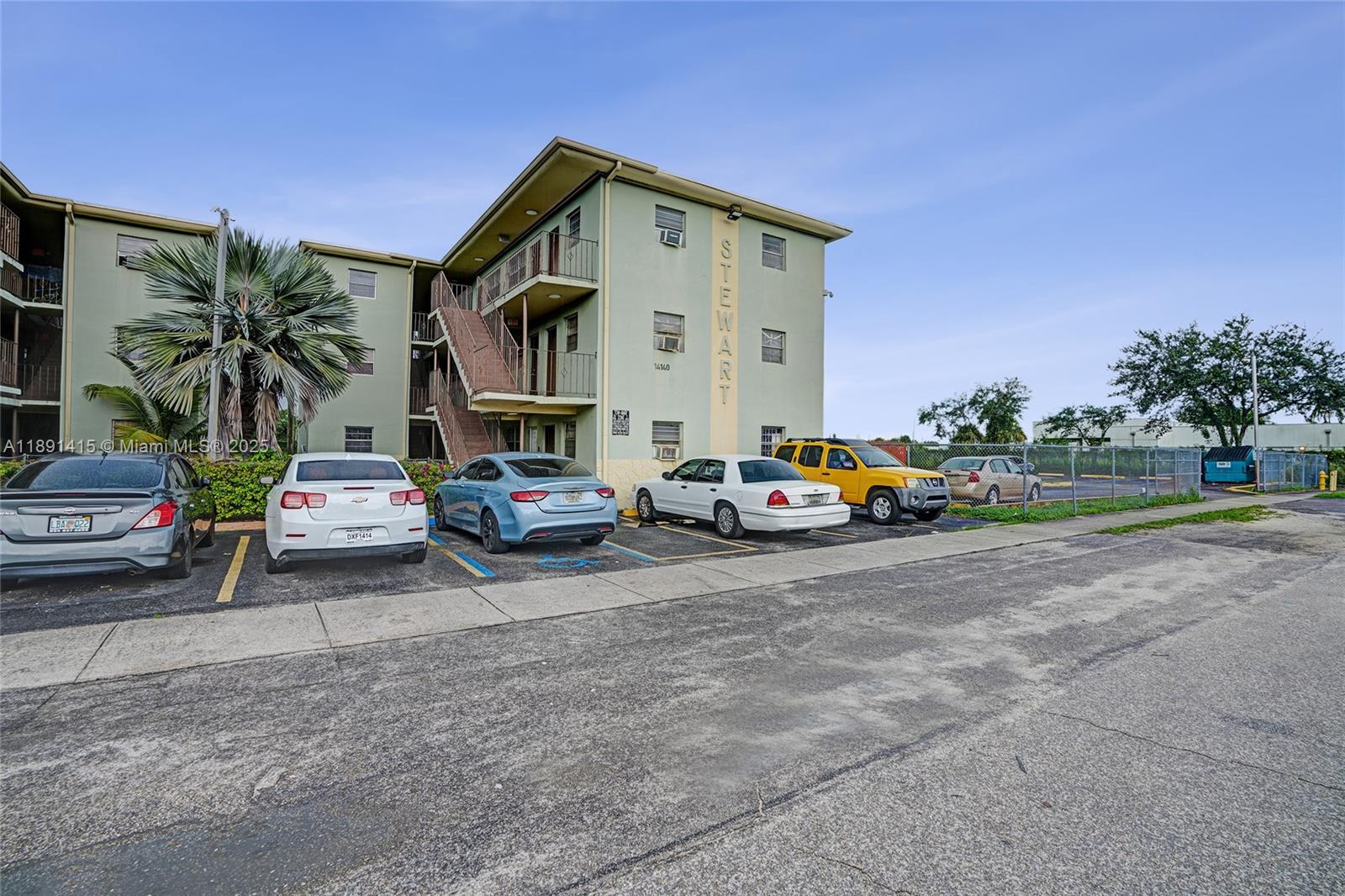 14120 Northwest 24th Court, Unit 304 Opa-Locka, FL 33054 - Photo 21 of 21 a car parked in front of a house