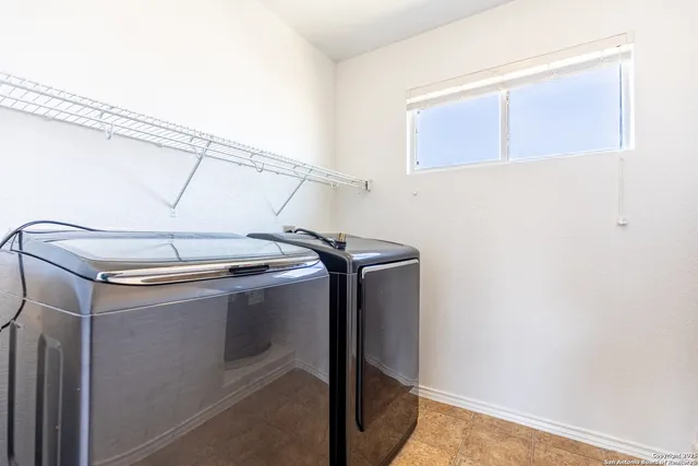 a view of storage and utility room