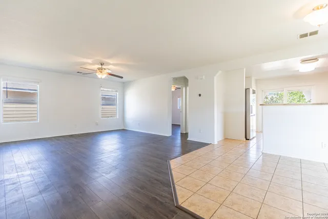 a view of a livingroom with wooden floor