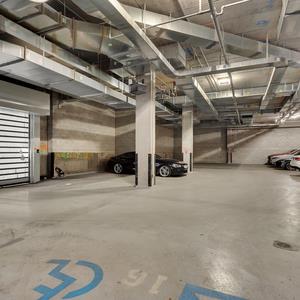 611 West 56th Street, Unit 12 Manhattan, NY 10019 - Photo 12 of 24 a view of a room with wooden walls