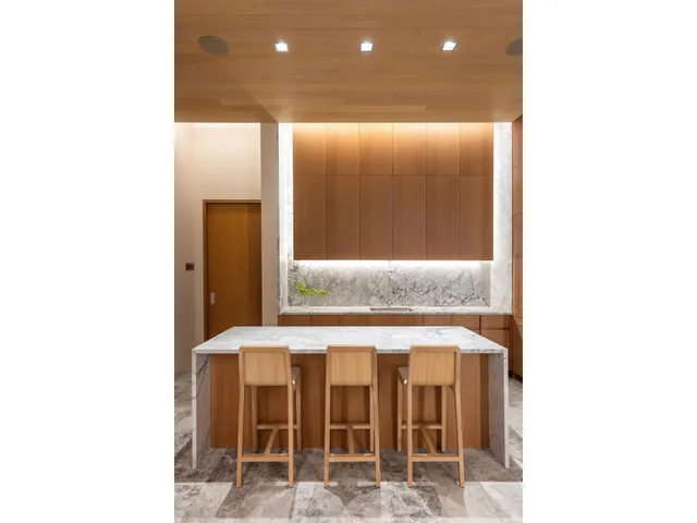 a view of a hallway with a white walls