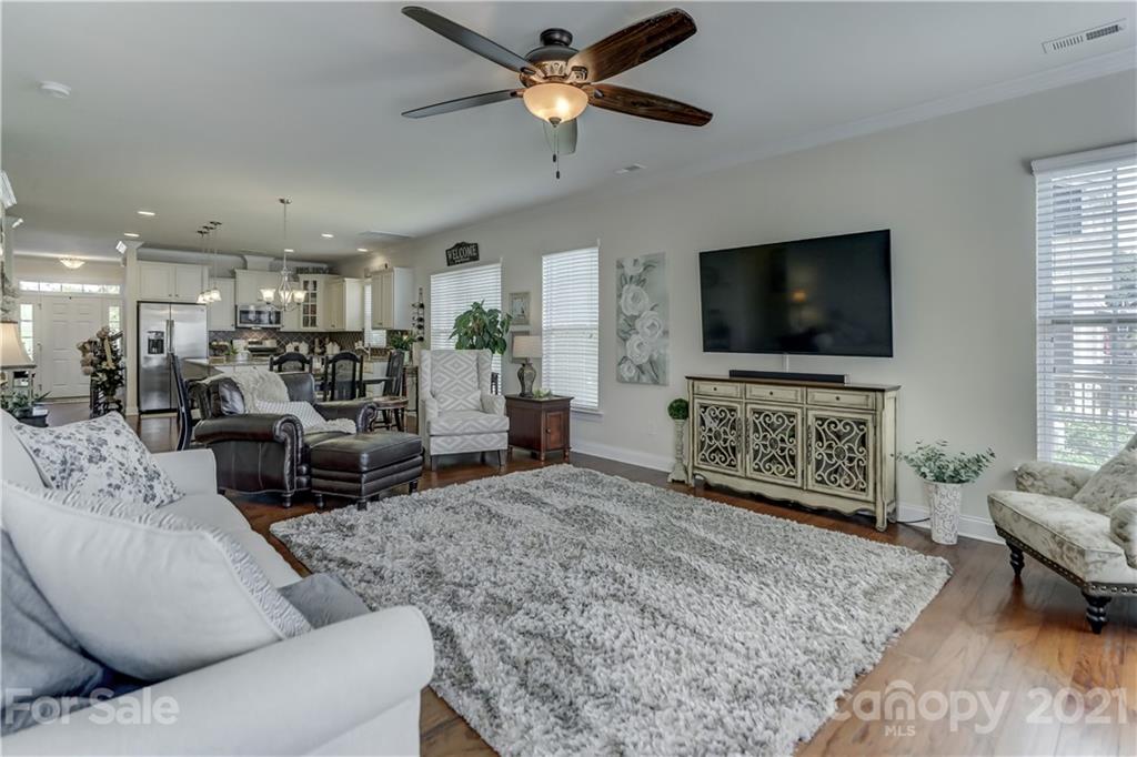 2016 Henslow Trail Tega Cay, SC 29708 - Photo 12 of 33 a living room with furniture and a flat screen tv