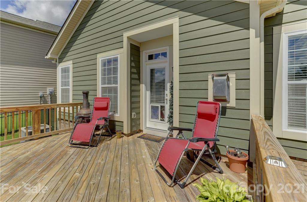 2016 Henslow Trail Tega Cay, SC 29708 - Photo 29 of 33 a sitting area with furniture and wooden deck
