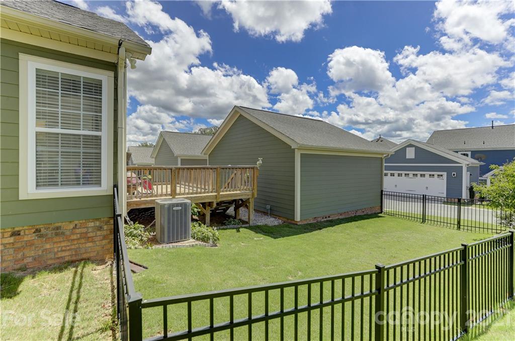 2016 Henslow Trail Tega Cay, SC 29708 - Photo 31 of 33 a view of a backyard with a sitting area