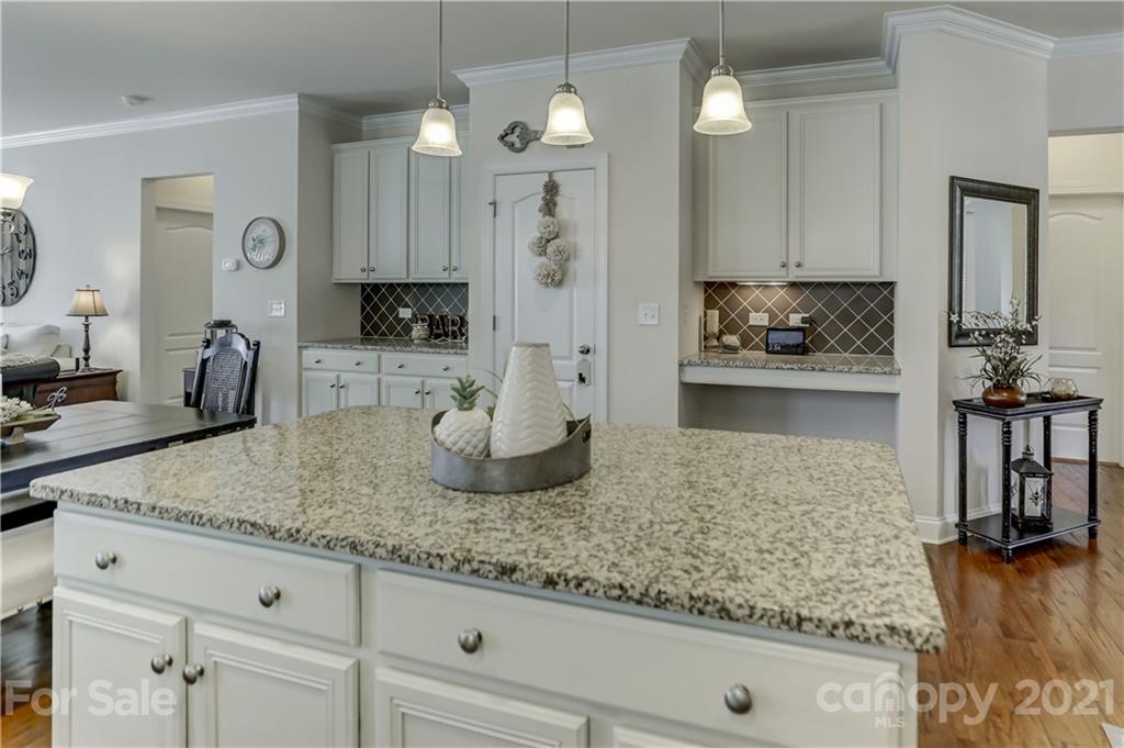 2016 Henslow Trail Tega Cay, SC 29708 - Photo 9 of 33 a kitchen with sink and refrigerator