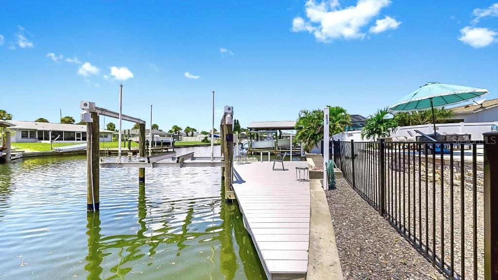 1004 Sago Palm Way Apollo Beach, FL 33572 - Photo 4 of 25 a view of a balcony with dining table