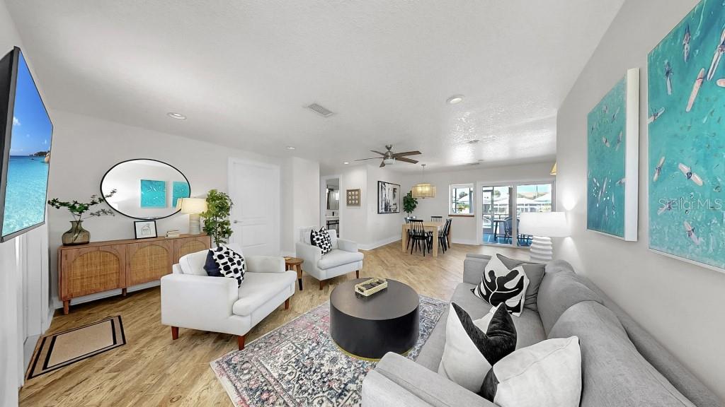 1004 Sago Palm Way Apollo Beach, FL 33572 - Photo 10 of 25 a living room with furniture and a large window