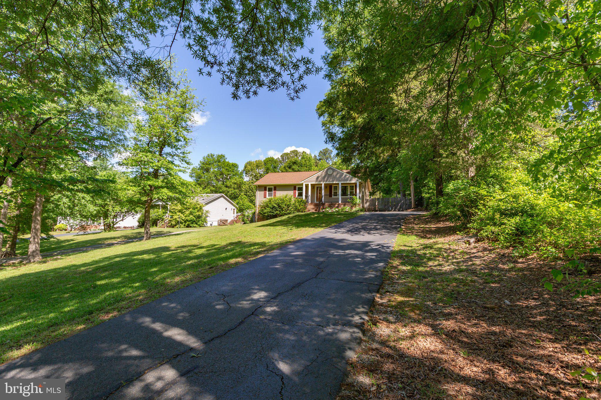 910 Ficklen Road Fredericksburg, VA 22405 - Photo 3 of 45 Long asphalt driveway leads to the home