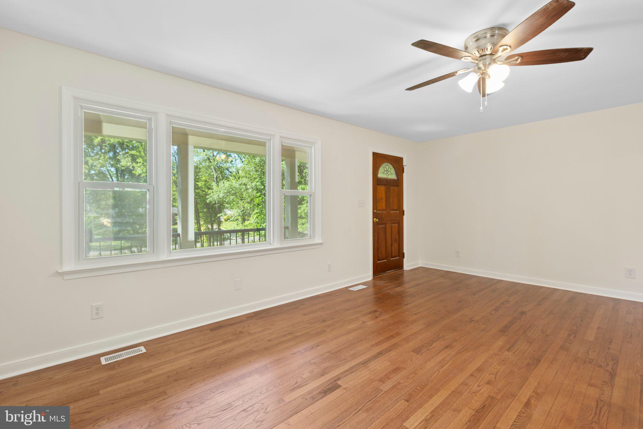 910 Ficklen Road Fredericksburg, VA 22405 - Photo 8 of 45 Family room has huge windows for natural light