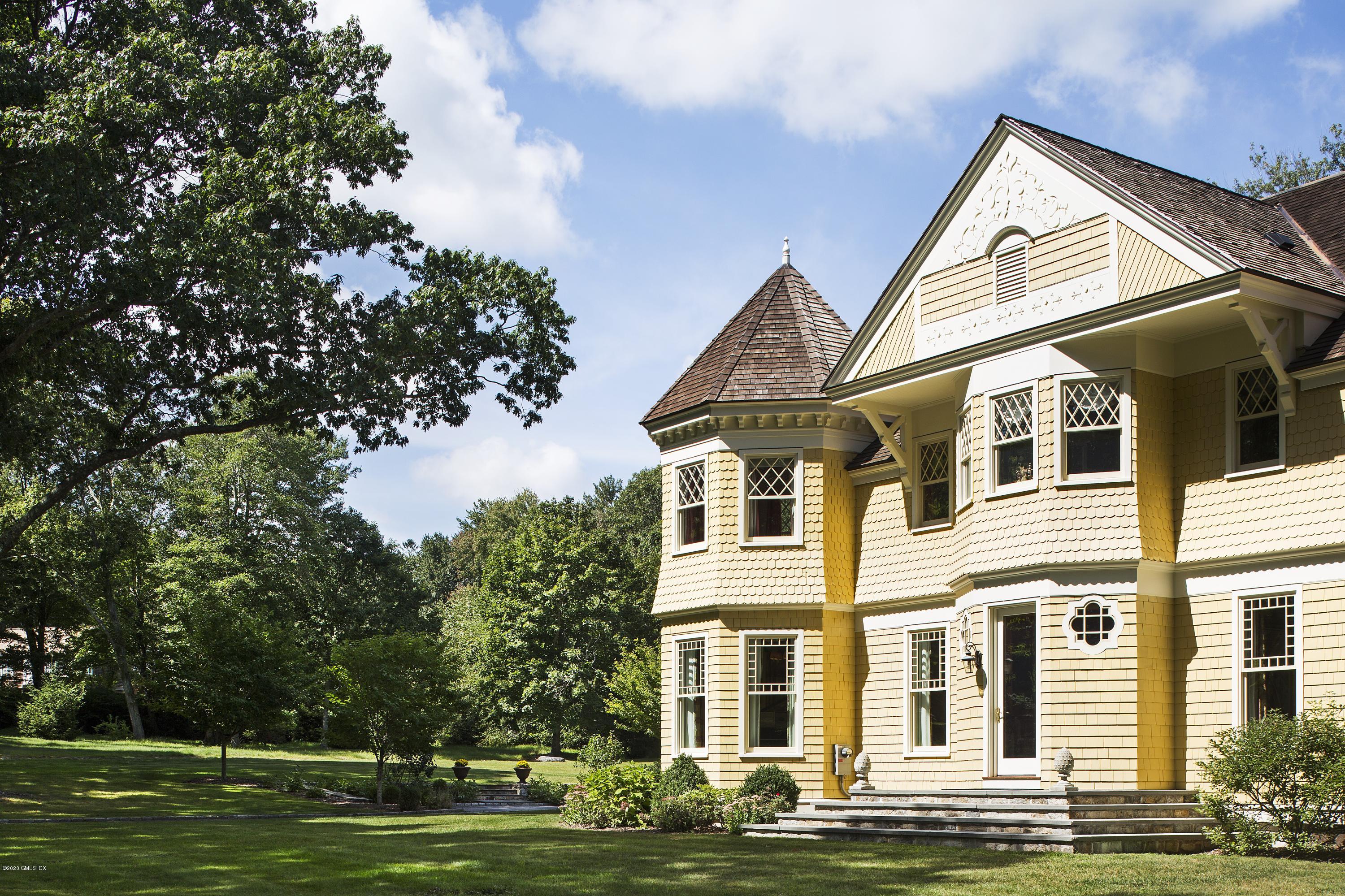 123 Kettle Creek Road Weston, CT 06883 - Photo 26 of 41 a view of a house with a yard