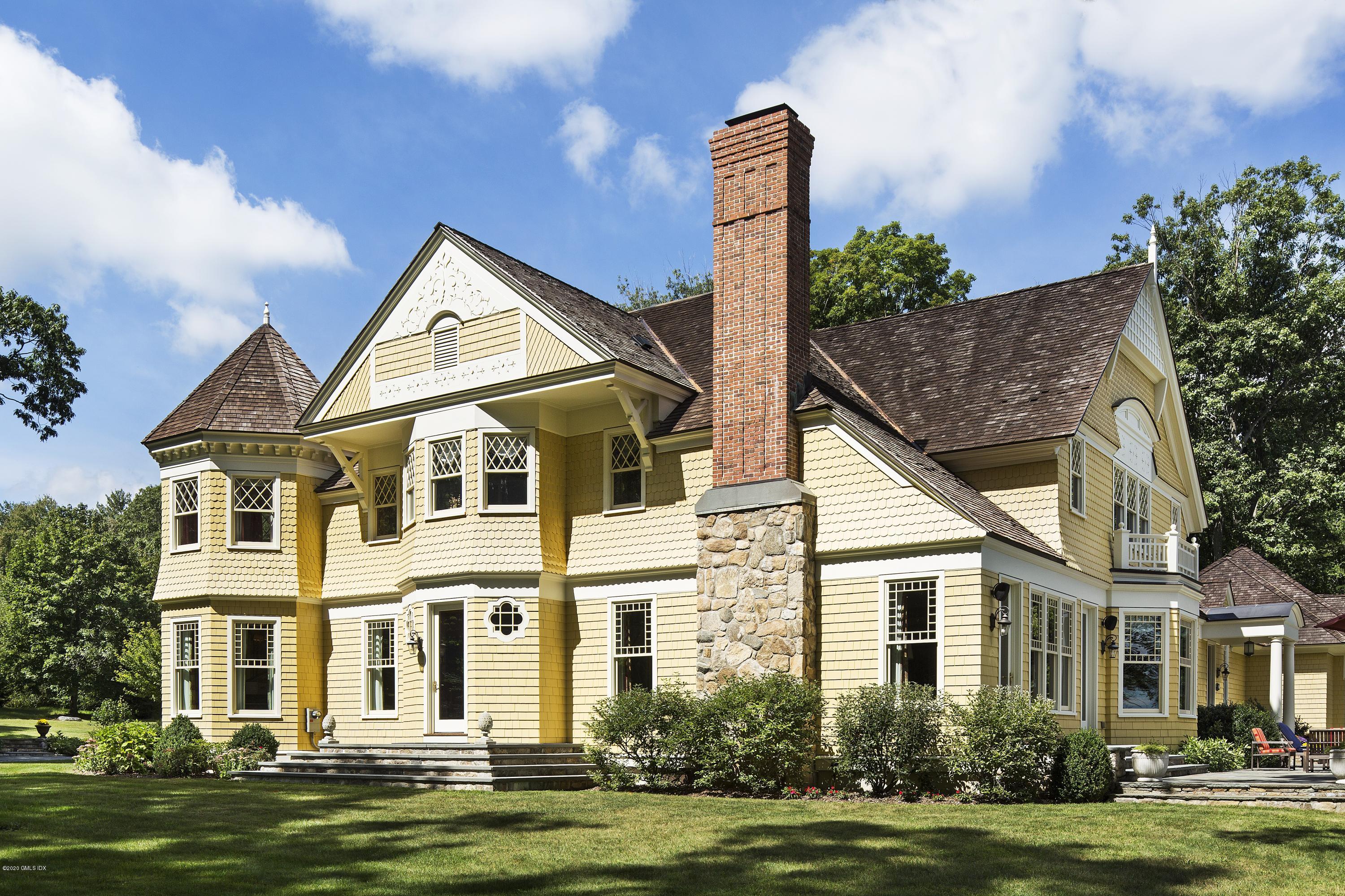 123 Kettle Creek Road Weston, CT 06883 - Photo 27 of 41 a front view of a house with a garden