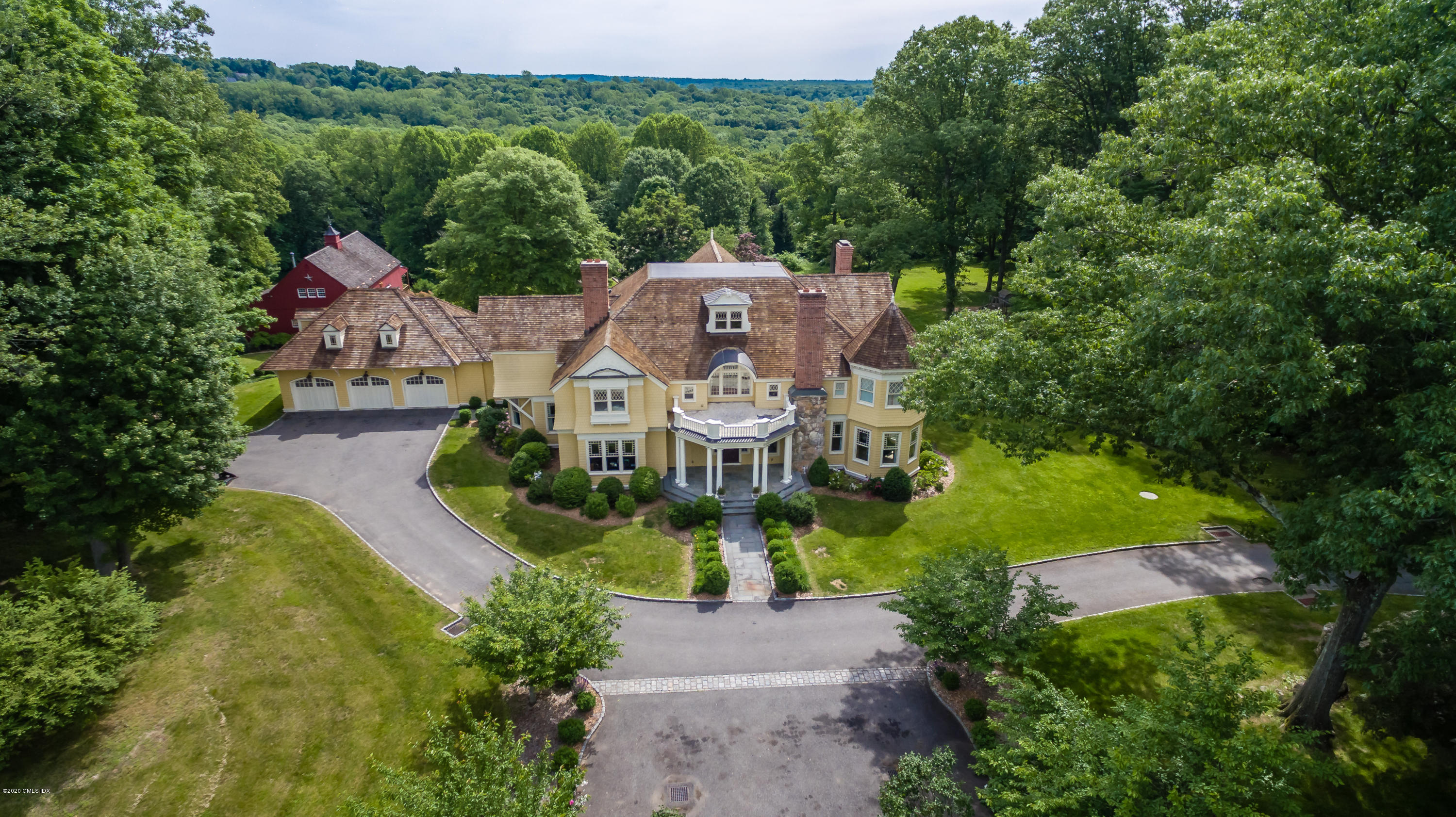 123 Kettle Creek Road Weston, CT 06883 - Photo 32 of 41 an aerial view of a house with a garden and lake view