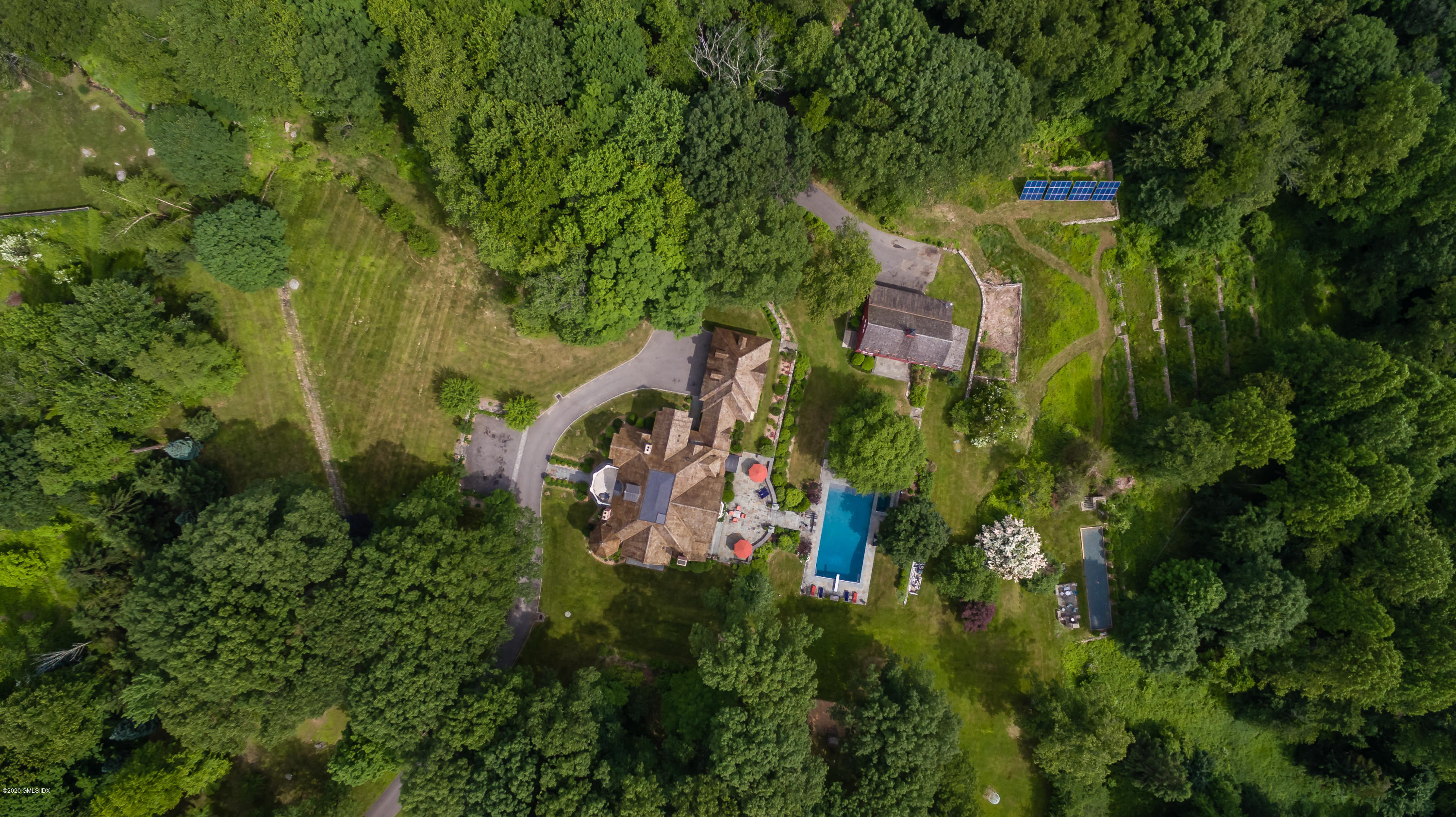 123 Kettle Creek Road Weston, CT 06883 - Photo 34 of 41 an aerial view of residential house with outdoor space and trees all around