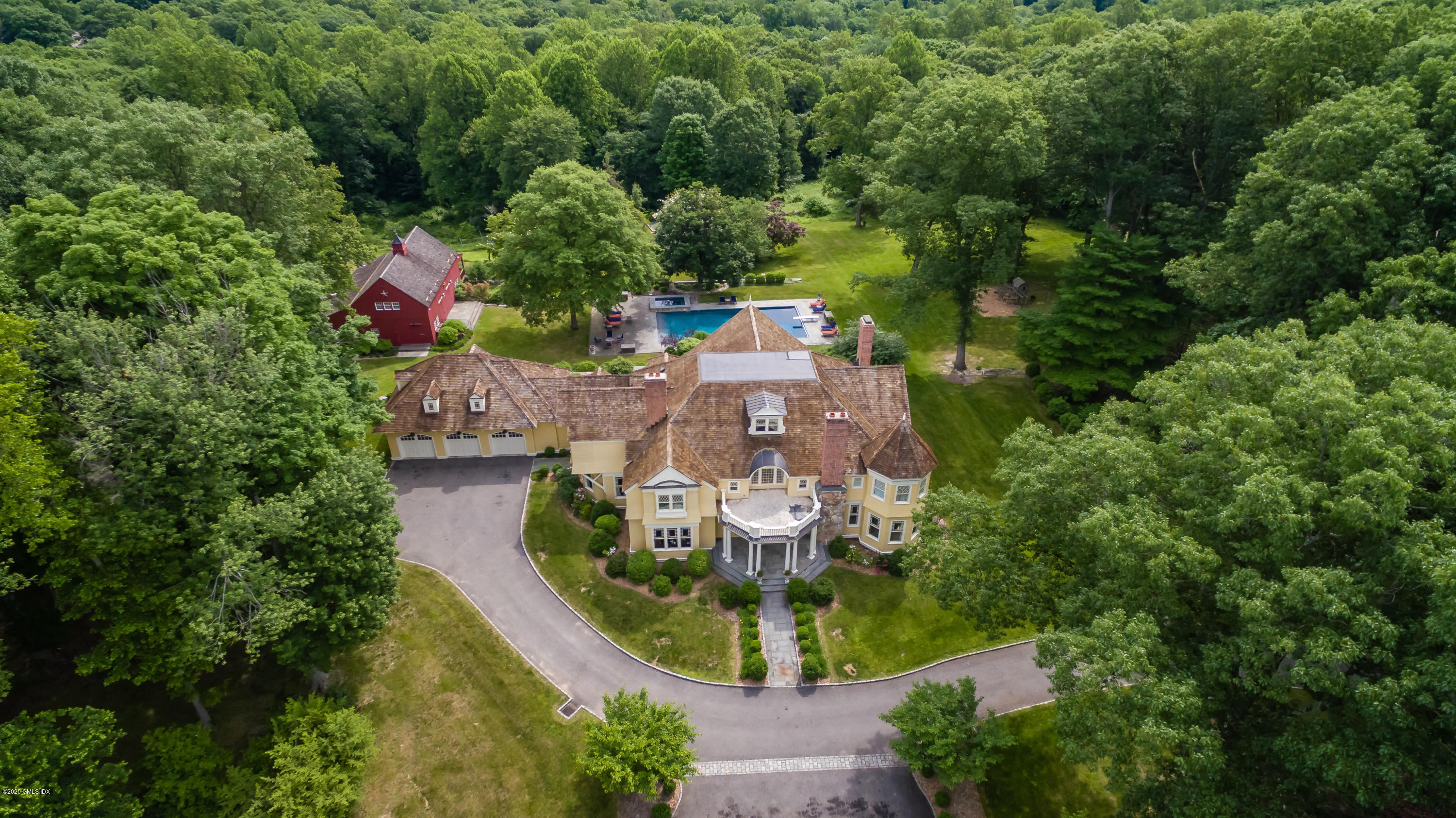 123 Kettle Creek Road Weston, CT 06883 - Photo 35 of 41 an aerial view of a house with a garden