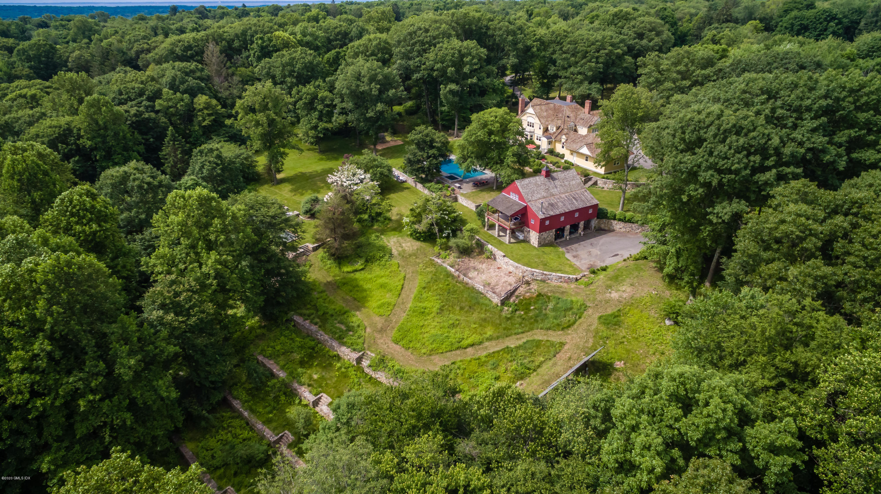 123 Kettle Creek Road Weston, CT 06883 - Photo 40 of 41 an aerial view of residential houses with outdoor space and trees