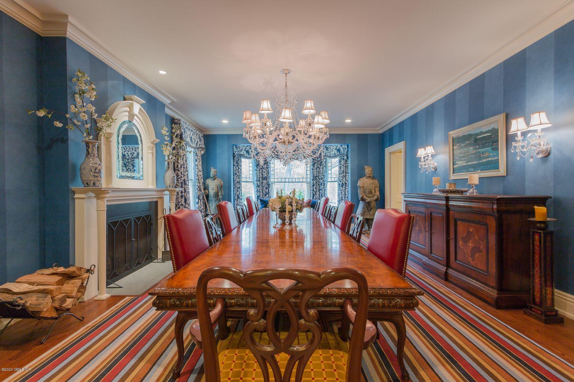 123 Kettle Creek Road Weston, CT 06883 - Photo 5 of 41 a view of a dining room with furniture a chandelier and wooden floor