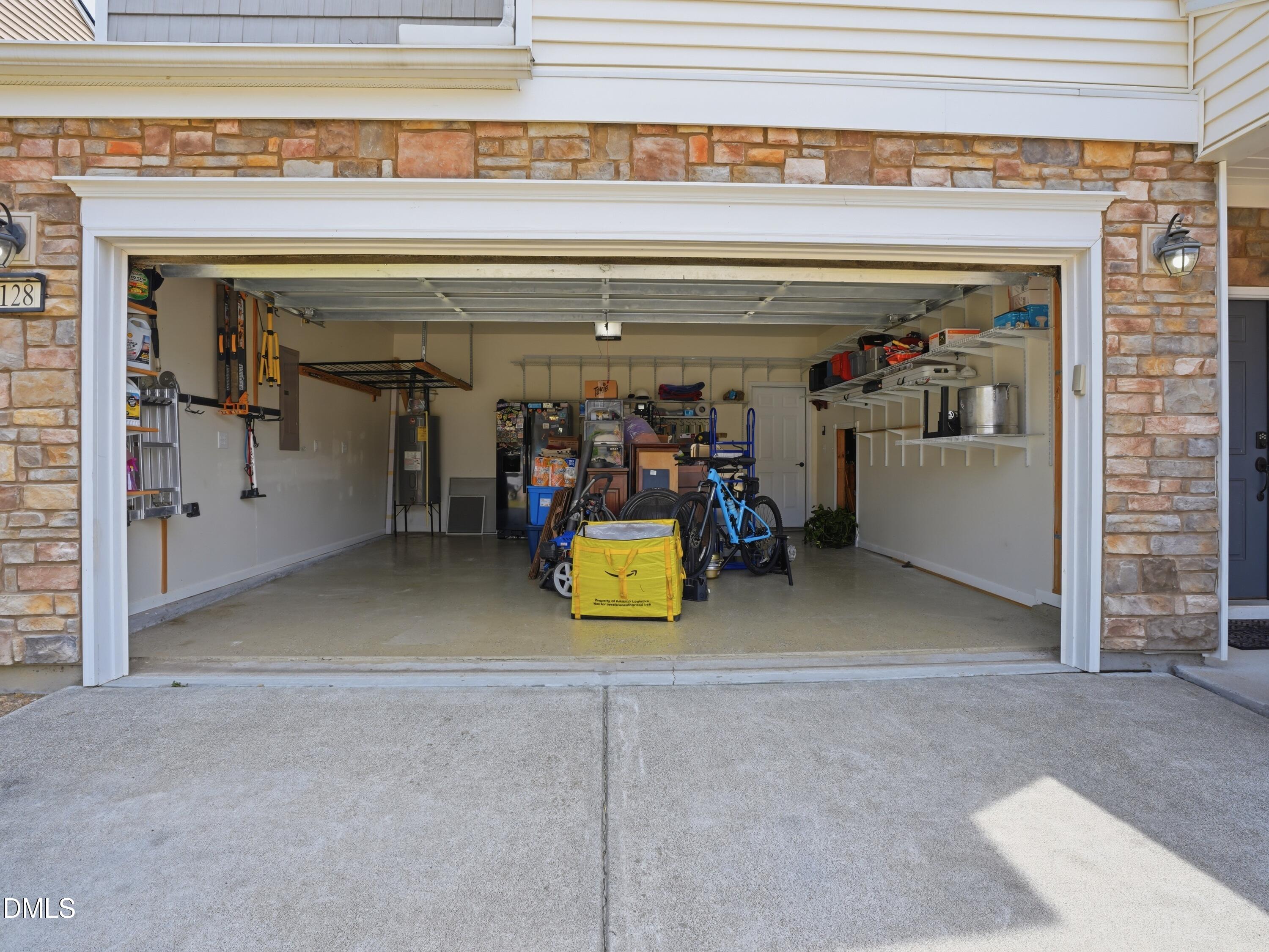8128 Hovingham Way Raleigh, NC 27616 - Photo 35 of 40 a view of a garage