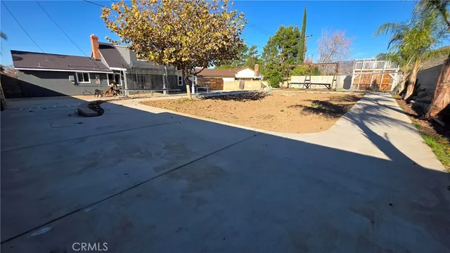 a view of a house with swimming pool