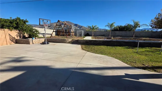 a view of a swimming pool with a garden