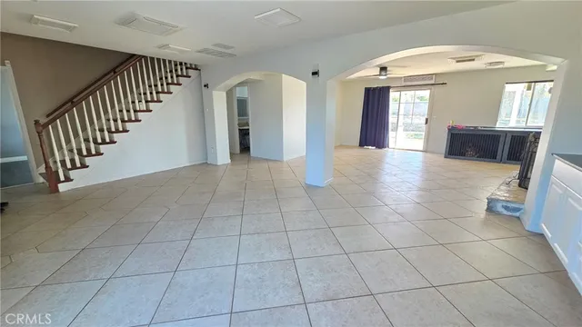 a view of a hallway with entryway door