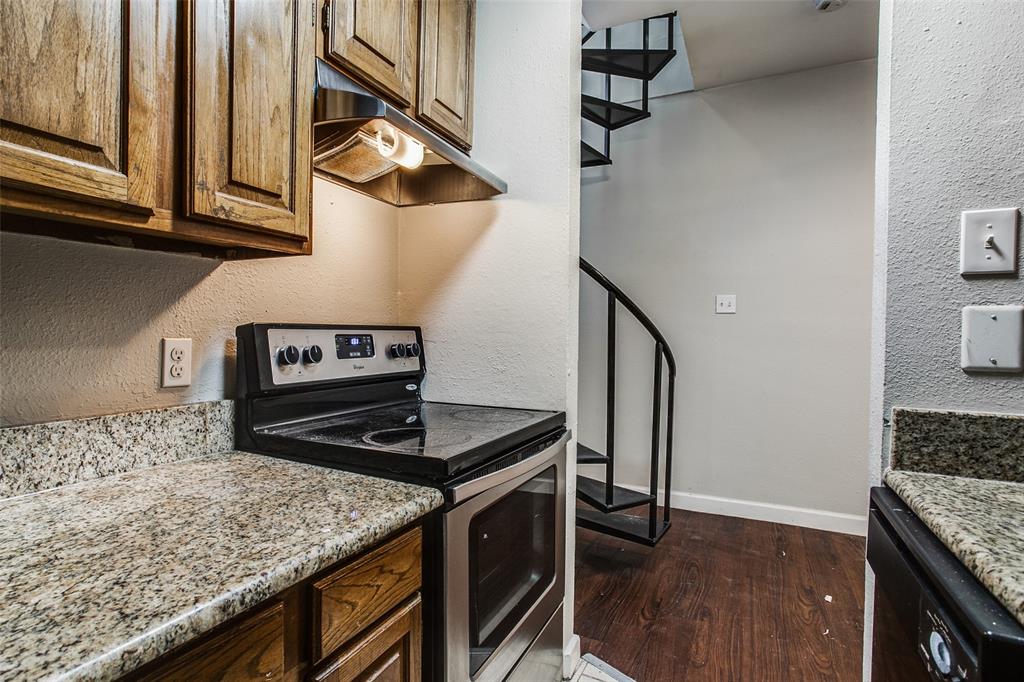 5114 Bryan Street, Unit 3 Dallas, TX 75206 - Photo 15 of 22 a kitchen with stainless steel appliances granite countertop a stove and a sink