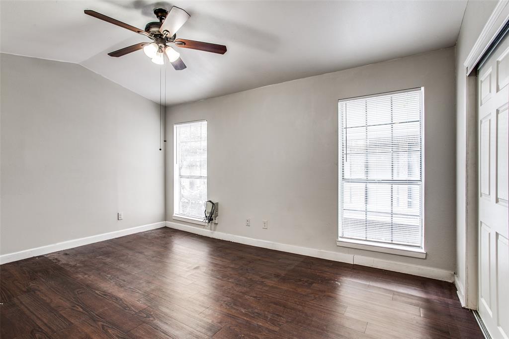 5114 Bryan Street, Unit 3 Dallas, TX 75206 - Photo 17 of 22 a view of empty room with wooden floor and fan