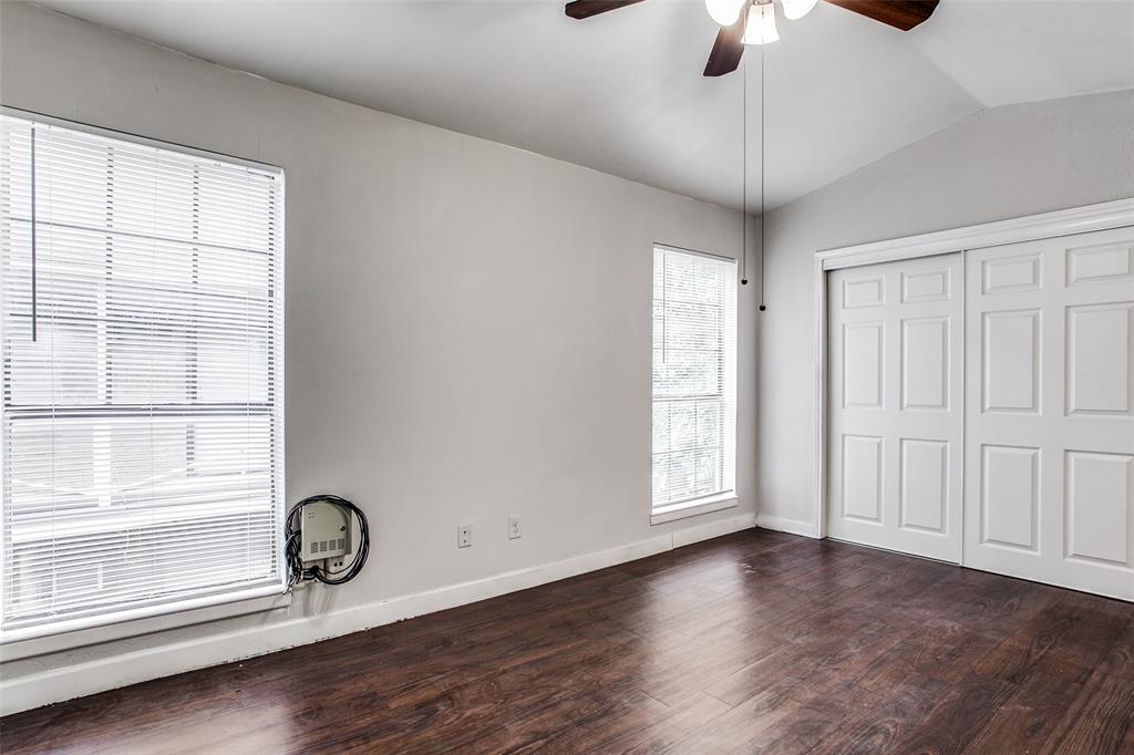 5114 Bryan Street, Unit 3 Dallas, TX 75206 - Photo 18 of 22 wooden floor in an empty room with a window